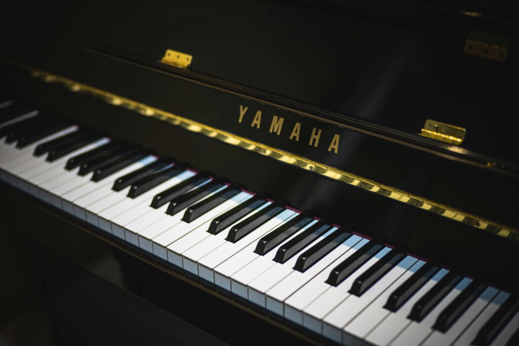 A close up of a Yamaha piano.